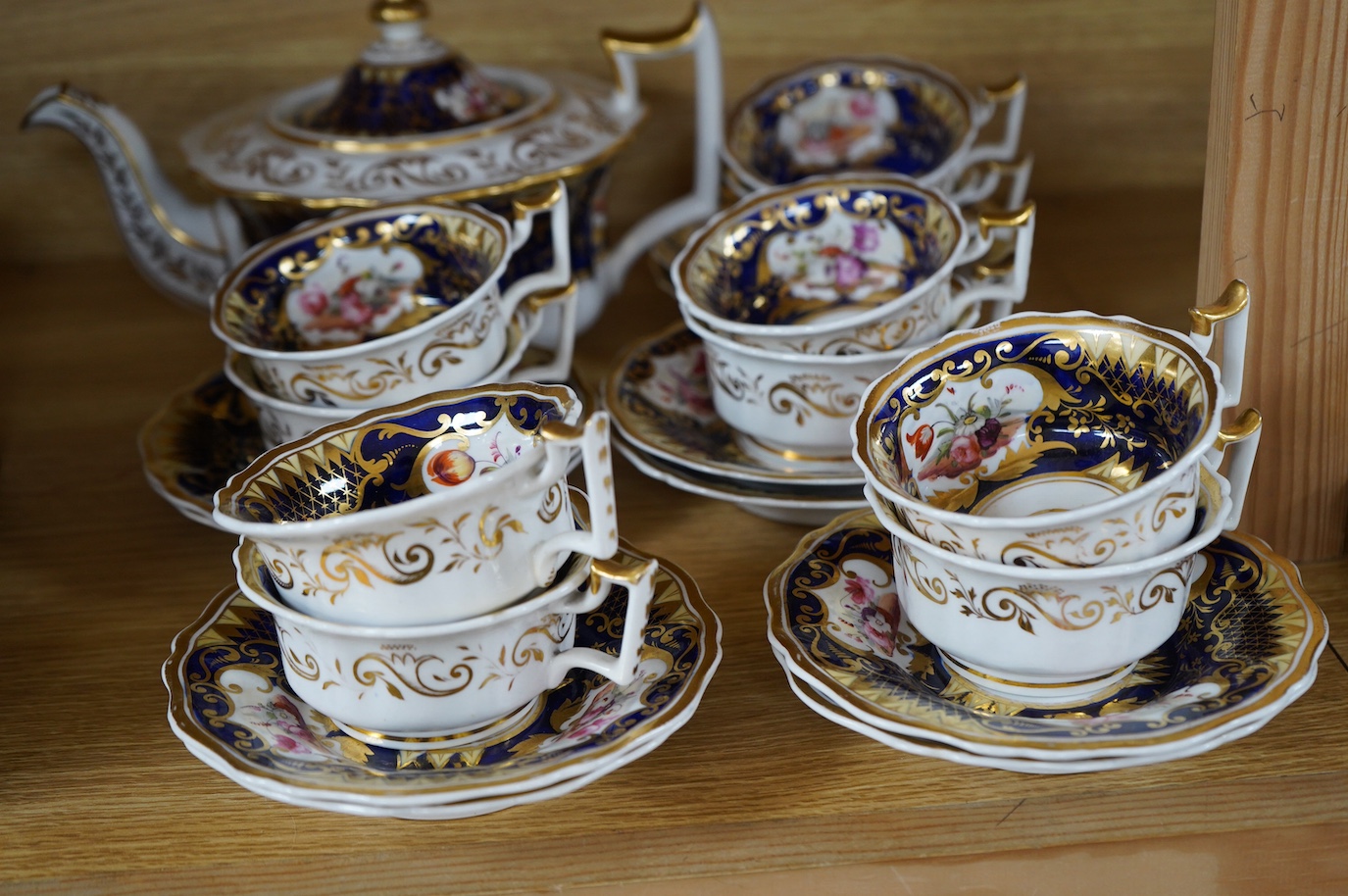 An early 19th century English porcelain London shape part tea set. Condition - varies